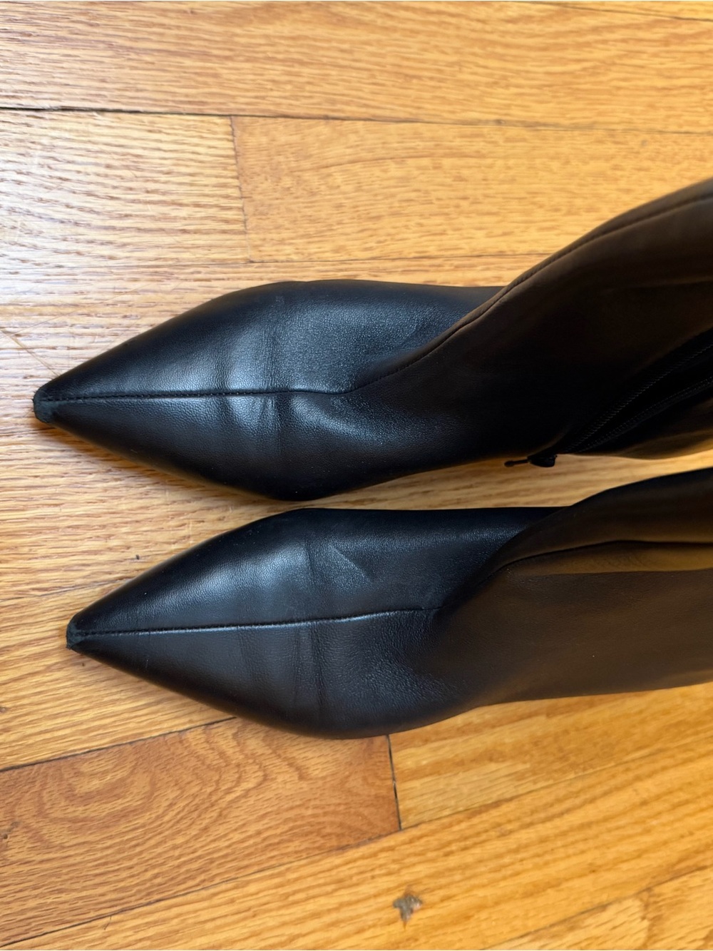 Sleek Black Pointed-Toe Heeled Boots with Side Zip